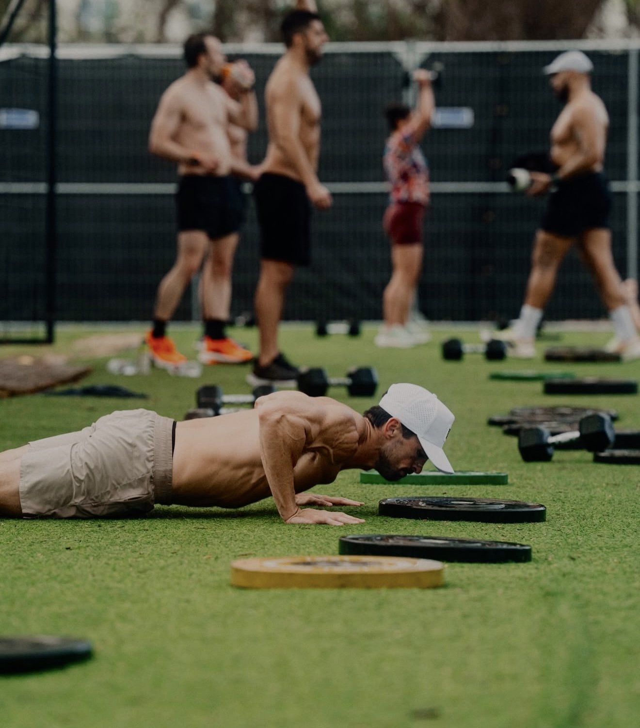 Dr. Clay Moss training on a track field